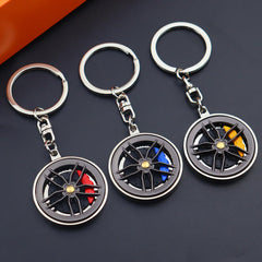 Rotatable Car Hub Keychain - Stylish Alloy Pendant for Vehicle Enthusiasts, Perfect Gift Idea