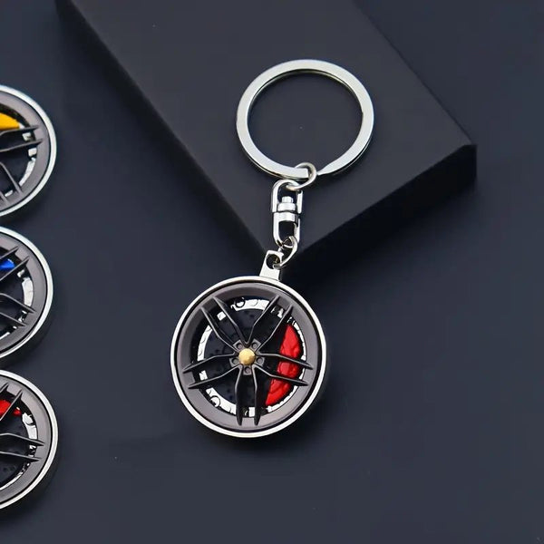 Rotatable Car Hub Keychain - Stylish Alloy Pendant for Vehicle Enthusiasts, Perfect Gift Idea